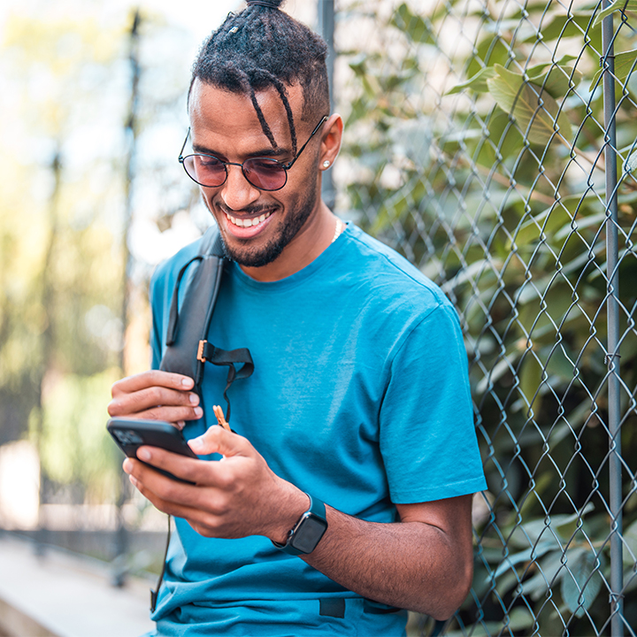 person looking at their phone 